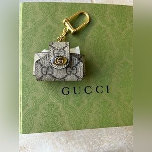 Gucci AirPod case.  Never used